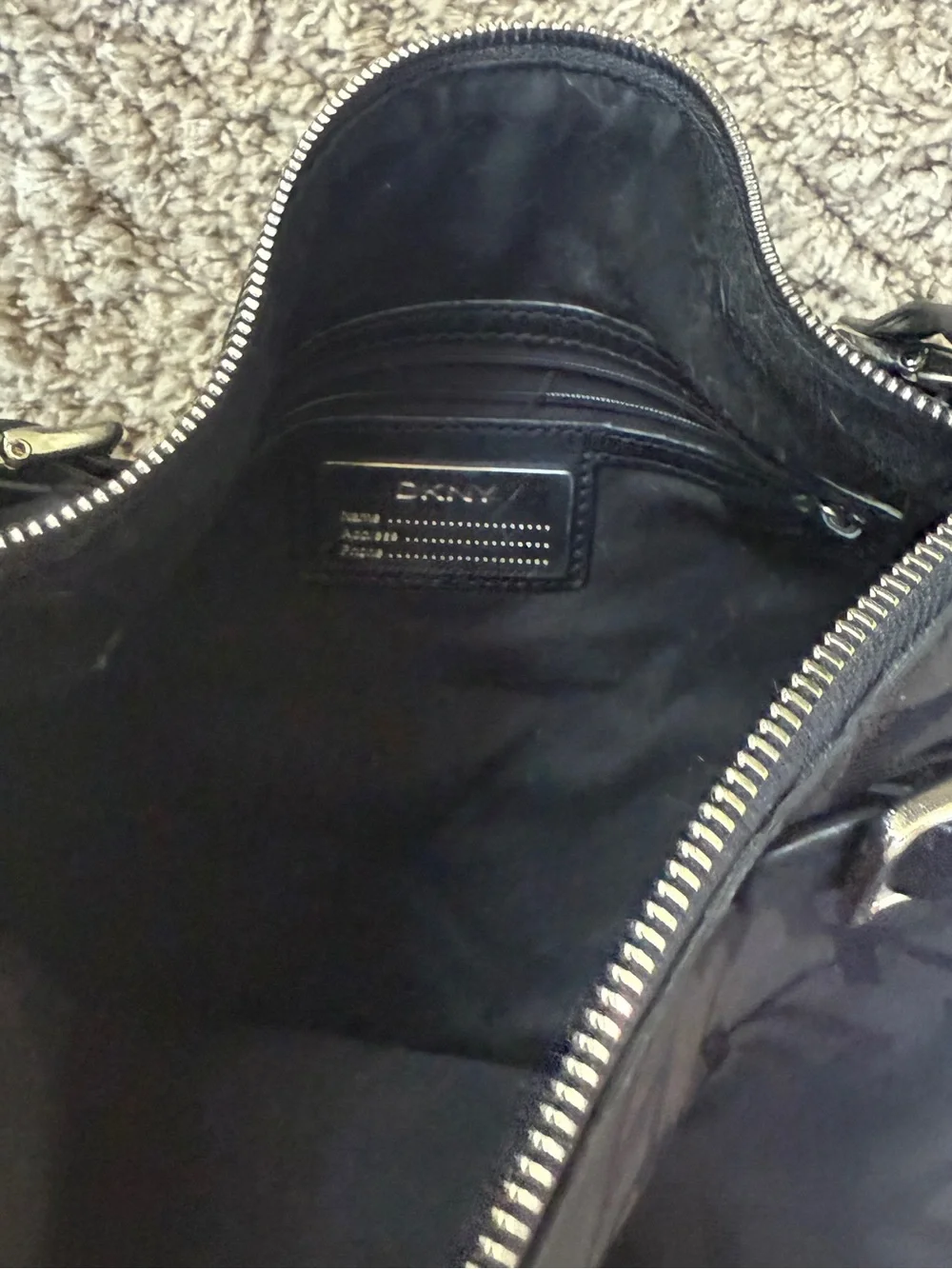 DKNY Black Monogram Messenger Bag with Gold Buckle Accents